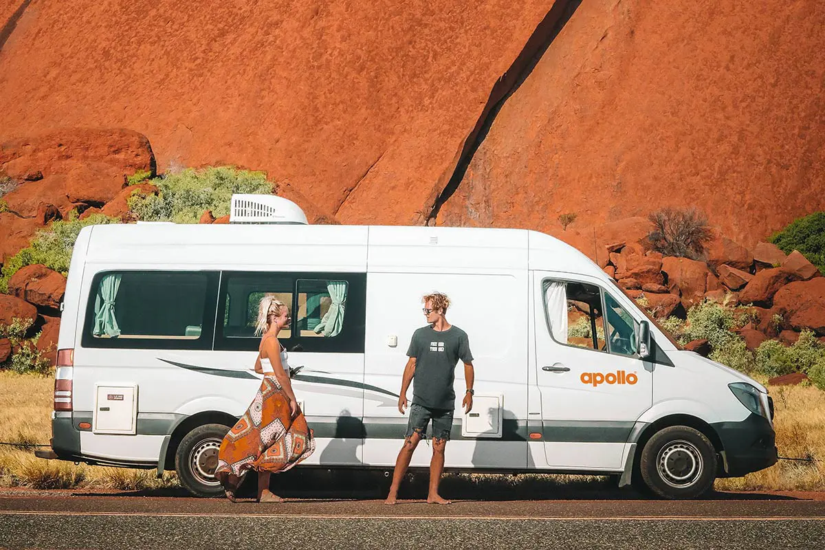 Spaceships campervan on Australian road with sugarcane fields